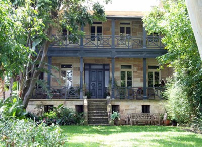 Leichhardt Lodge is also thought to be by Michael Golden. It is a handsome, symmetrical two-storey sandstone residence, set back from the street.